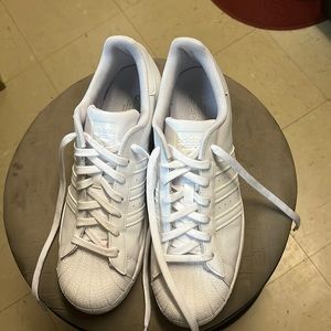 Size 11 white adidas, worn only once.